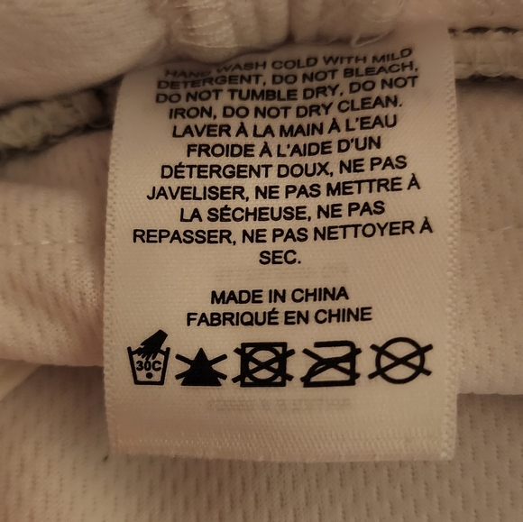 ARITZIA TNA Passenger Bucket Hat Drawstring in White M/L - Picture 7 of 8